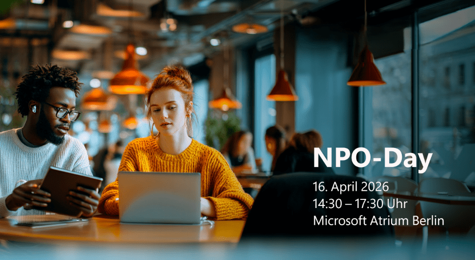 Ein Mann und eine Frau sitzen vor einem Laptop im Cafe. Text: NPO-Day, 16. April 2026 in Berlin